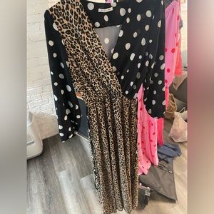 Unique dress! Very flattering. If you ❤️ dots & animal print this is YOUR dress!